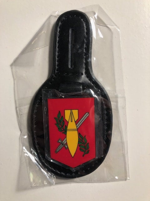 Huidig gedragen hanger
