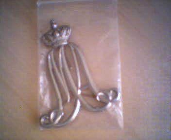 schouderembl_kma_zilver.jpg